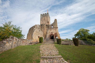 Low angle view of old ruins against sky