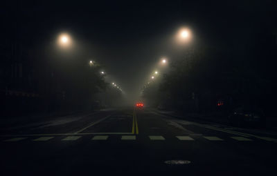 Cars on road at night