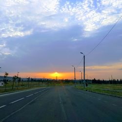 Road against sky during sunset