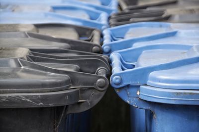 Close-up of garbage bins