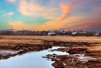 Sunset sky over the marsh and sesuit creek in east dennis in winter