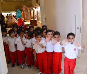 Portrait of children standing in corridor