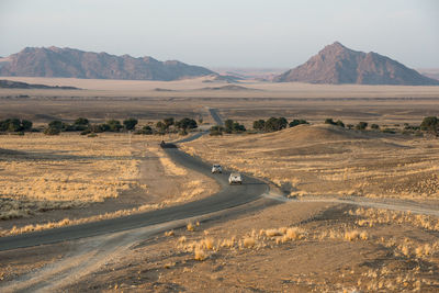 Dirt road passing through a desert