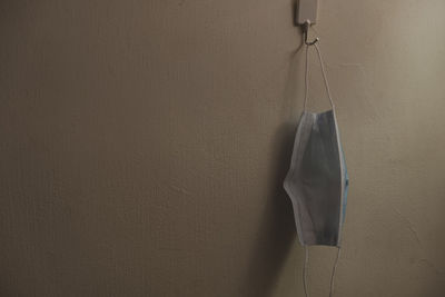 Close-up of clothes drying on wall