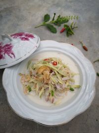 High angle view of salad in plate on table