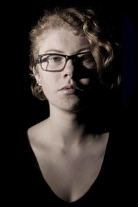 Close-up portrait of serious young woman