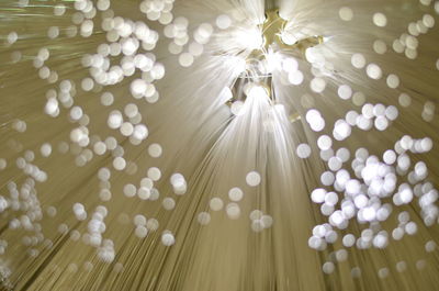 Defocused image of illuminated lights at night