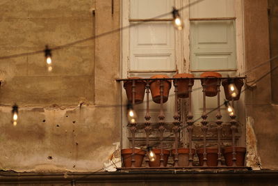 Low angle view of illuminated lantern hanging at night