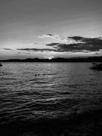 Scenic view of sea against sky at sunset