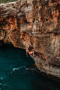 Deep water solo climbing rock