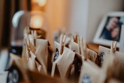 Close-up of paper bags with clothespins