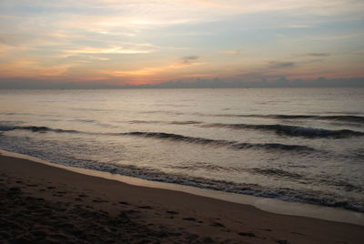 Scenic view of sea against sky during sunset