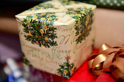 Close-up of text of giftbox on table