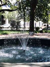 Water fountain in swimming pool at park