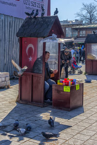 People on street in city