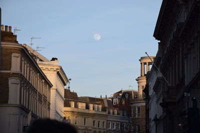 Low angle view of buildings against clear sky