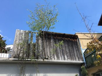 Low angle view of building against blue sky