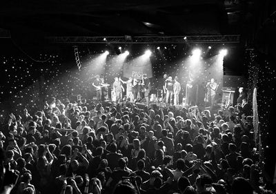 People enjoying music concert