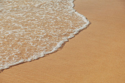 High angle view of sand on beach