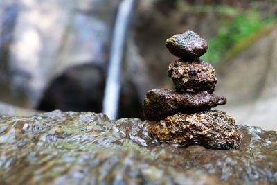 Close-up of stone stack on rock