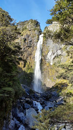 View of waterfall in forest