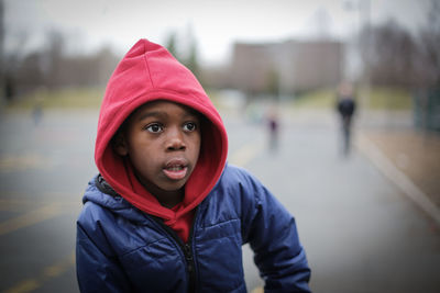 Portrait of boy in snow