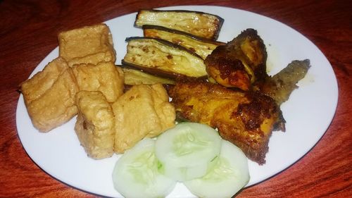 Close-up of served food on table