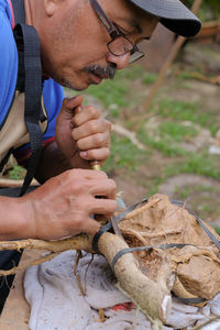 Midsection of man working