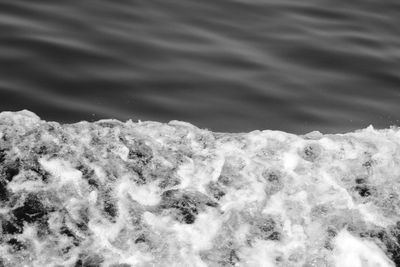 Close-up of surf on beach