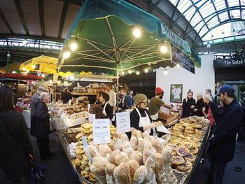 People at market stall