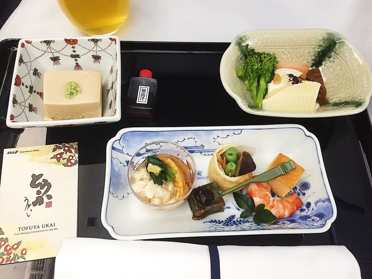 HIGH ANGLE VIEW OF SUSHI SERVED IN PLATE ON TABLE