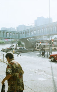 Woman standing in city