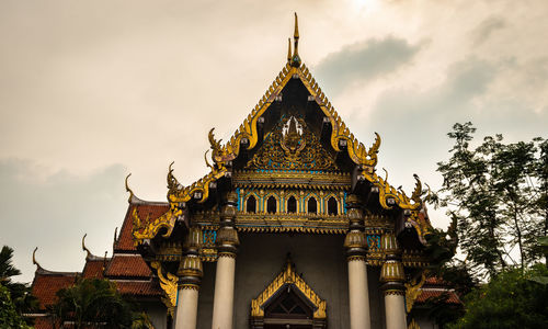 Low angle view of temple building against sky