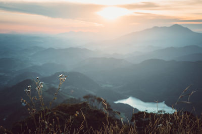 Scenic view of mountains against sky during sunset