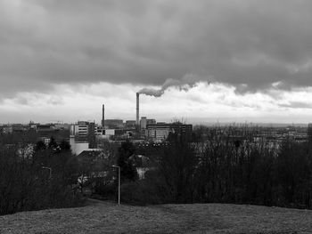 View of factory against sky