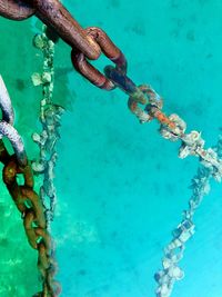 High angle view of chain on swimming pool