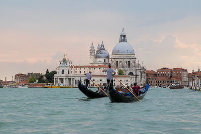 View of boats in canal at temple