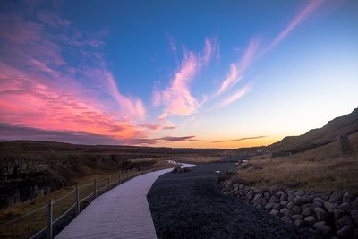 Road against sky during sunset