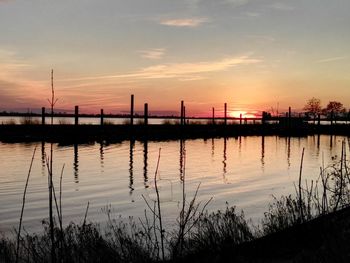 Scenic view of sea against sky at sunset
