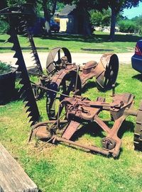 Old cart on grassy field