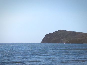 Scenic view of sea against clear sky