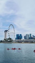 View of ferris wheel in city