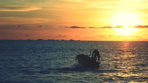 Scenic view of sunset over sea