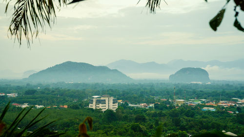 Scenic view of townscape against sky