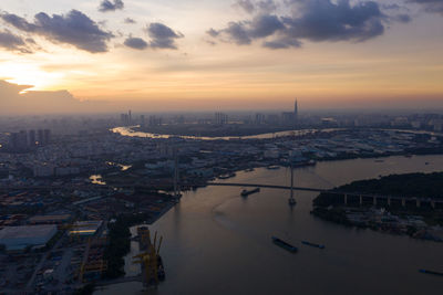 High angle view of city buildings during sunset