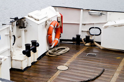 High angle view of lifebelt on boat at sea