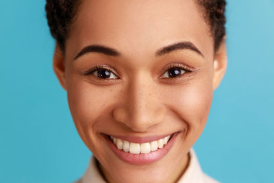 Close-up portrait of young woman