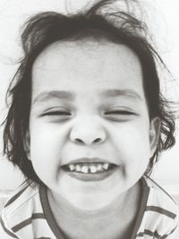 Close-up portrait of a smiling girl