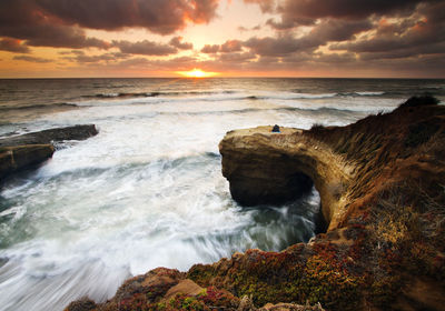 Scenic view of sea against sky during sunset