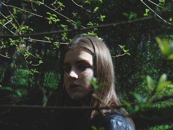 Portrait of woman in forest